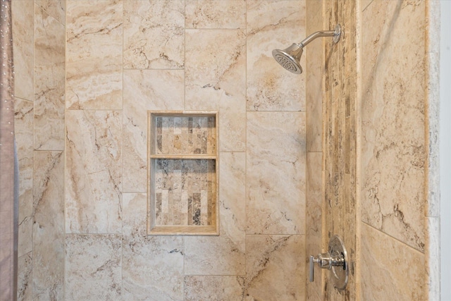 details with a tile shower