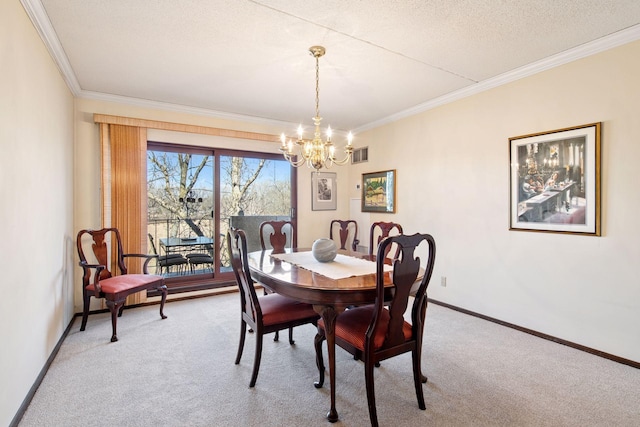 dining room with carpet, visible vents, an inviting chandelier, and crown molding