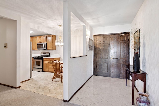 interior space featuring baseboards