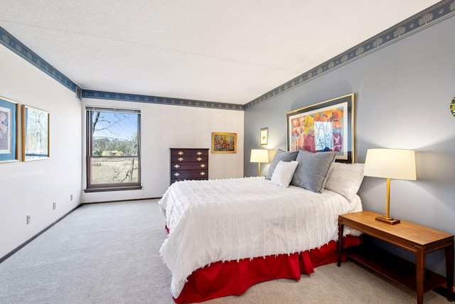 bedroom with carpet and baseboards