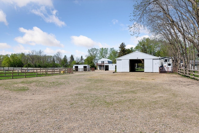 view of yard with an outbuilding and an exterior structure