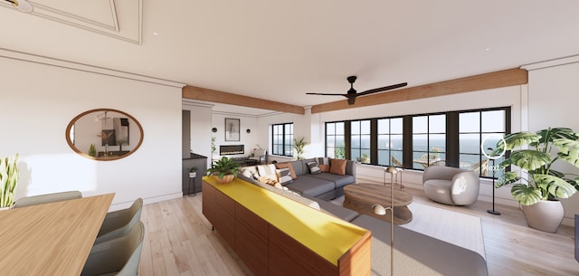 living room with beamed ceiling, light wood-style floors, a ceiling fan, and attic access