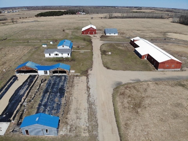birds eye view of property featuring a rural view