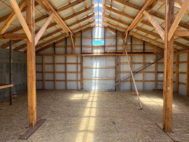 misc room with lofted ceiling