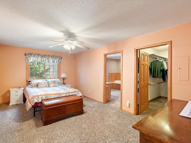 1587 Stallion Rd SW, Pillager, MN 56473 - carpeted bedroom featuring a ceiling fan, a closet, a textured ceiling, baseboards, and a spacious closet
