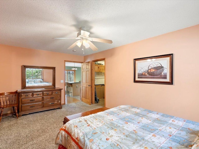 1587 Stallion Rd SW, Pillager, MN 56473 - bedroom with a ceiling fan, a closet, a textured ceiling, a walk in closet, and carpet floors