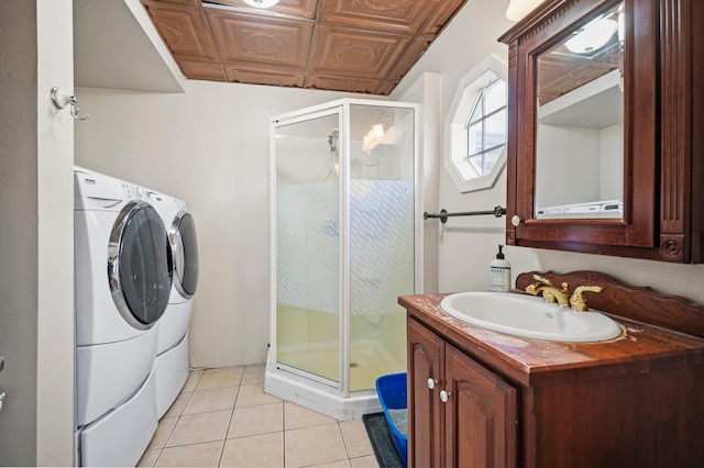 13150 345th Ave, Waseca, MN 56093 - full bathroom with tile patterned floors, vanity, washer and clothes dryer, and a shower stall