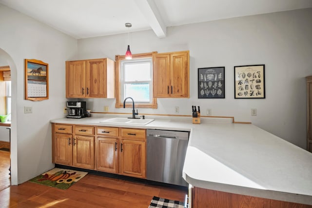 13150 345th Ave, Waseca, MN 56093 - kitchen featuring a peninsula, stainless steel dishwasher, beam ceiling, a sink, and dark wood-style flooring