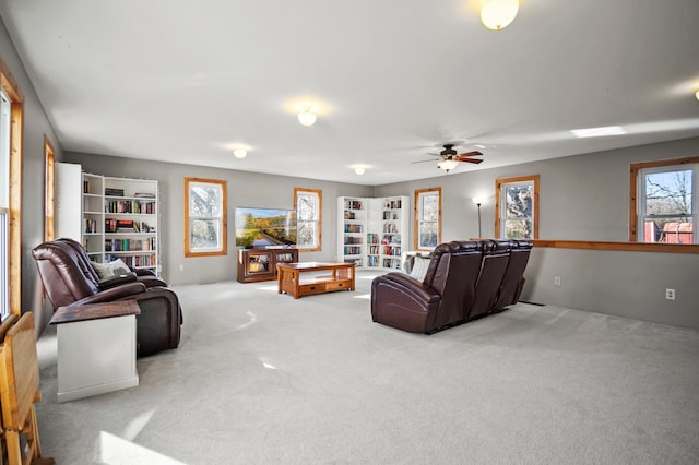 13150 345th Ave, Waseca, MN 56093 - living area with a ceiling fan and carpet flooring