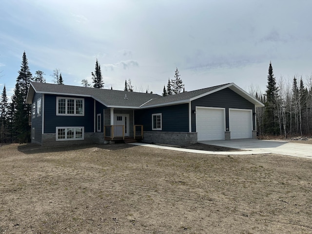 56626 Birchwood Dr, Warroad, MN 56763 - ranch-style home with an attached garage and driveway