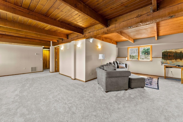 carpeted living area with wood ceiling, baseboards, and beam ceiling