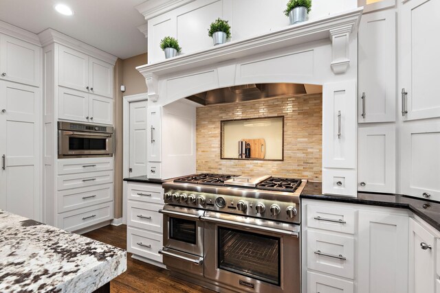2012 Pine Ridge Dr W, Saint Paul, MN 55118 - kitchen featuring decorative backsplash, dark wood-style floors, recessed lighting, white cabinets, and stainless steel appliances