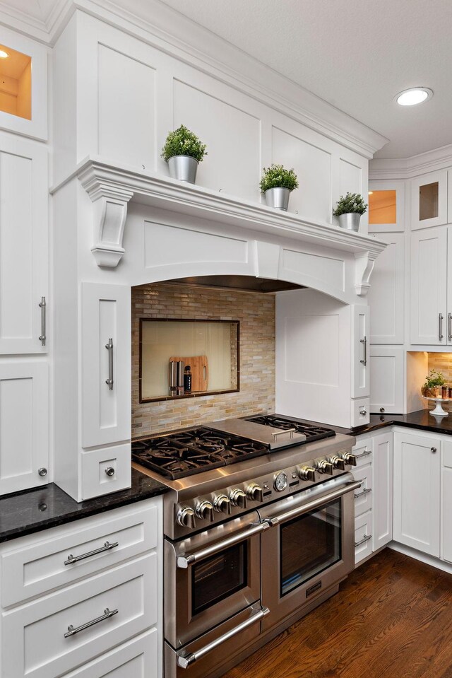 2012 Pine Ridge Dr W, Saint Paul, MN 55118 - kitchen with white cabinets, decorative backsplash, double oven range, dark wood-type flooring, and glass insert cabinets