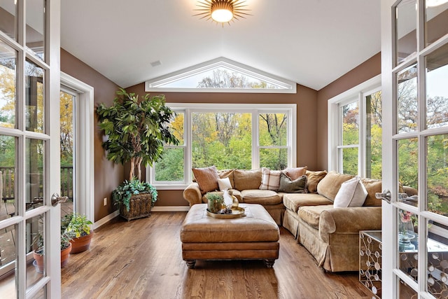 2012 Pine Ridge Dr W, Saint Paul, MN 55118 - sunroom / solarium with baseboards, wood finished floors, and lofted ceiling