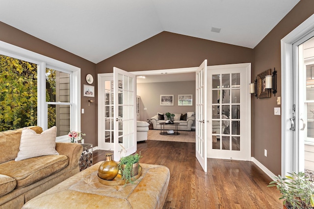 2012 Pine Ridge Dr W, Saint Paul, MN 55118 - living room featuring baseboards, french doors, lofted ceiling, and dark wood-type flooring