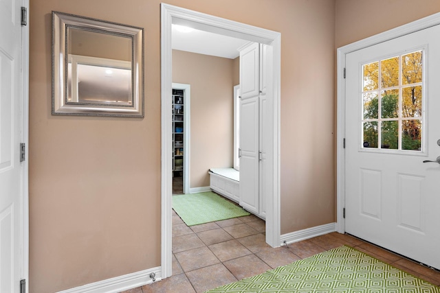 2012 Pine Ridge Dr W, Saint Paul, MN 55118 - doorway to outside with light tile patterned floors and baseboards