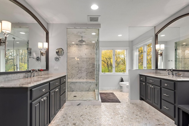 2012 Pine Ridge Dr W, Saint Paul, MN 55118 - full bathroom with recessed lighting, a sink, a marble finish shower, and two vanities