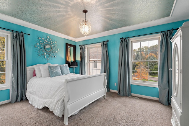 2012 Pine Ridge Dr W, Saint Paul, MN 55118 - carpeted bedroom featuring baseboards, a textured ceiling, and a chandelier