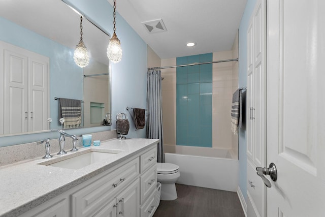 2012 Pine Ridge Dr W, Saint Paul, MN 55118 - full bathroom with visible vents, vanity, shower / bath combination with curtain, toilet, and recessed lighting