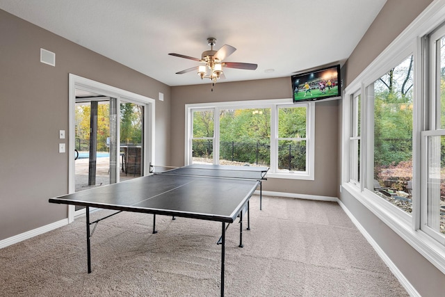 2012 Pine Ridge Dr W, Saint Paul, MN 55118 - playroom with carpet flooring, a ceiling fan, baseboards, and plenty of natural light