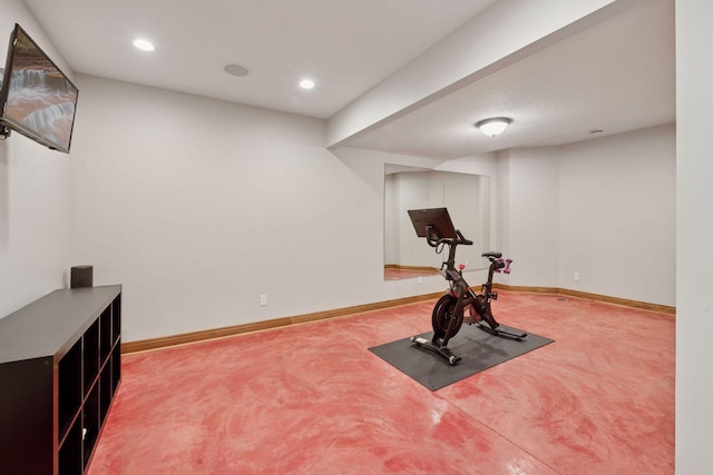workout area featuring carpet, baseboards, and recessed lighting
