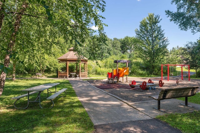 communal playground with a yard and a gazebo