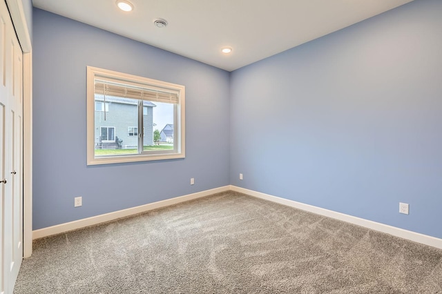15141 Partridge St NW, Andover, MN 55304 - carpeted empty room with baseboards and recessed lighting