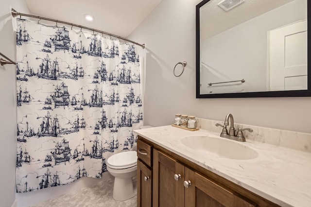 15141 Partridge St NW, Andover, MN 55304 - full bath featuring toilet, vanity, a shower with curtain, and tile patterned flooring