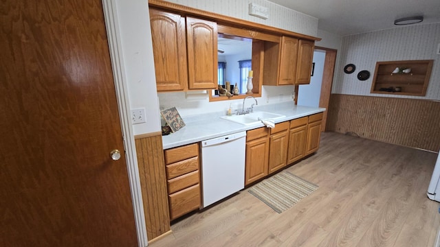 1509 2nd Ave SW, Austin, MN 55912 - kitchen with wallpapered walls, dishwasher, a sink, and light wood-style flooring