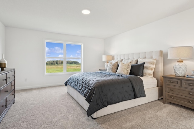 bedroom with light carpet, baseboards, and recessed lighting