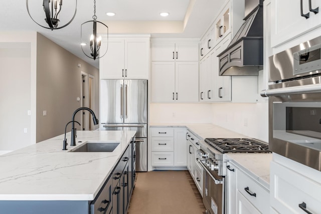 4729 Linden Cove Ln, Savage, MN 55378 - kitchen with a sink, premium range hood, white cabinets, premium appliances, and an island with sink