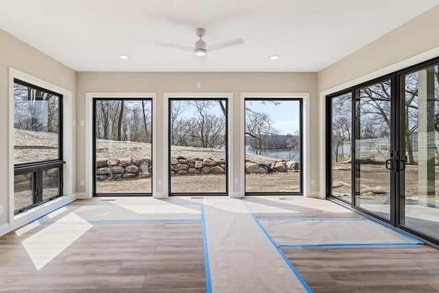 4729 Linden Cove Ln, Savage, MN 55378 - entryway with a water view, ceiling fan, recessed lighting, and wood finished floors