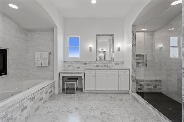 full bath with a tile shower, vanity, a whirlpool tub, marble finish floor, and recessed lighting