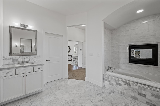 full bath featuring vanity, marble finish floor, recessed lighting, baseboards, and a bath