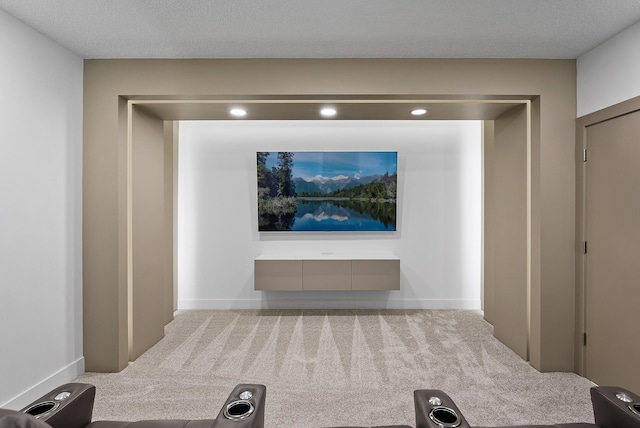 workout area with baseboards and carpet flooring