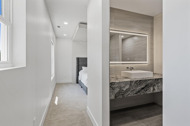 bathroom with vanity, ensuite bath, recessed lighting, baseboards, and visible vents
