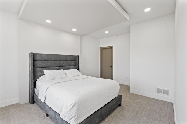 bedroom featuring baseboards, visible vents, recessed lighting, and light colored carpet