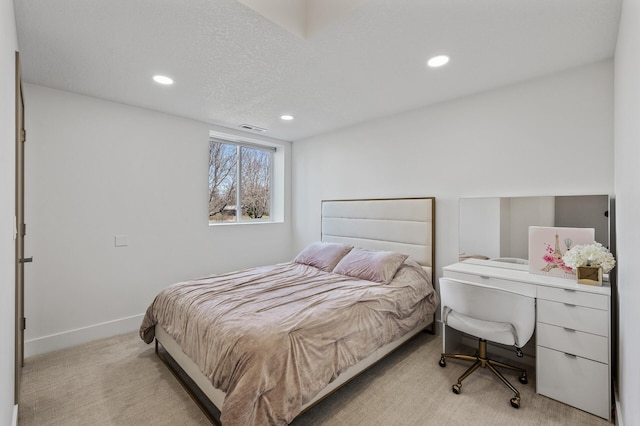 bedroom featuring light colored carpet, recessed lighting, baseboards, and visible vents