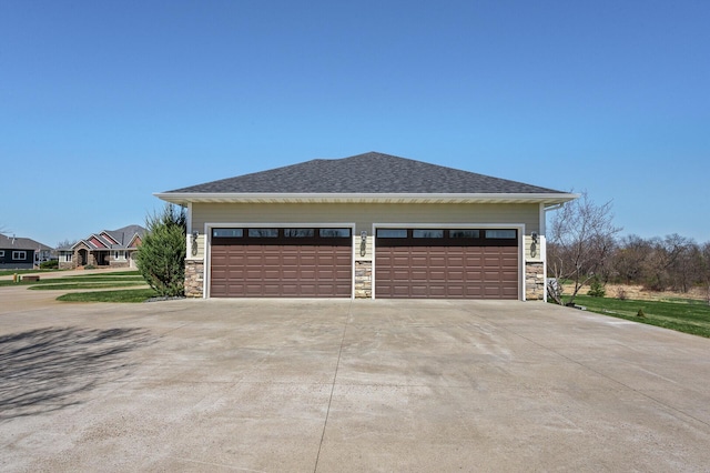 garage featuring driveway