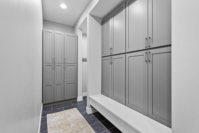 10906 Whitetail Rd, Rogers, MN 55374 - mudroom featuring dark tile patterned floors and recessed lighting