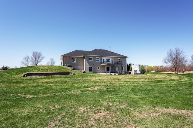 10906 Whitetail Rd, Rogers, MN 55374 - rear view of property with a balcony, a lawn, and a patio area