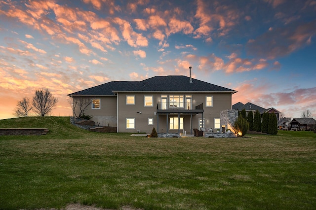 10906 Whitetail Rd, Rogers, MN 55374 - rear view of house featuring a yard
