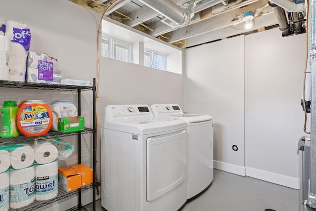 1744 Jefferson Ave, Saint Paul, MN 55105 - laundry area with washing machine and dryer and baseboards