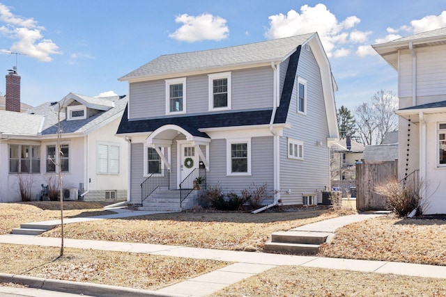 1744 Jefferson Ave, Saint Paul, MN 55105 - view of front of property featuring roof with shingles and central air condition unit