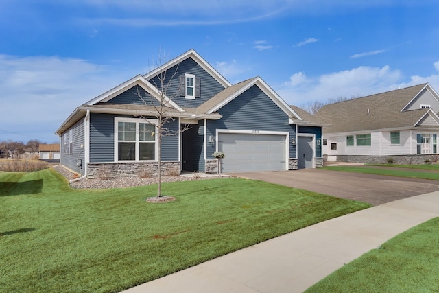 19336 Grass Lake Trl, Rogers, MN 55374 - craftsman house with a garage, driveway, stone siding, and a front yard