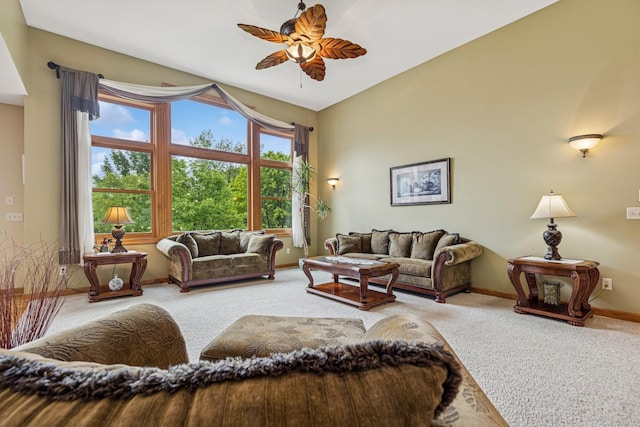 3041 209th Ln NW, Oak Grove, MN 55011 - carpeted living area featuring ceiling fan, baseboards, and lofted ceiling