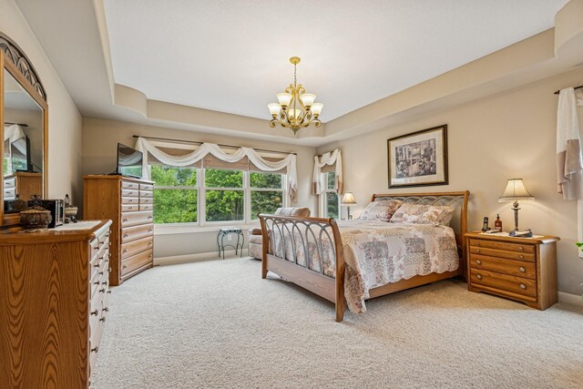 3041 209th Ln NW, Oak Grove, MN 55011 - carpeted bedroom with a chandelier, baseboards, and a tray ceiling