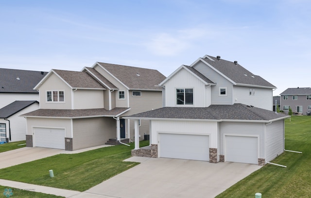 5521 8th St W, West Fargo, ND 58078 - view of front facade featuring a garage, concrete driveway, a front lawn, and a shingled roof