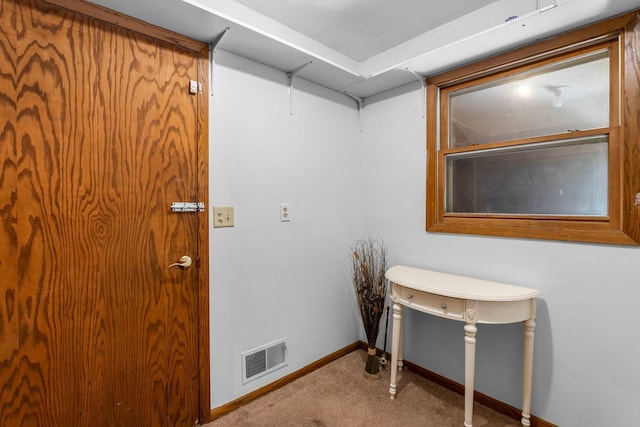 interior space with visible vents and carpet flooring