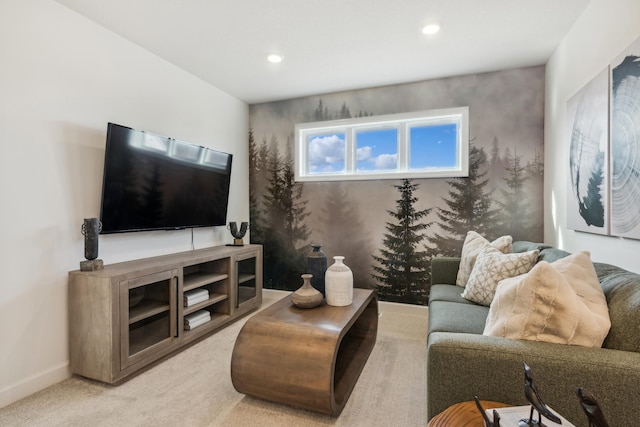 living room featuring recessed lighting, baseboards, and light colored carpet
